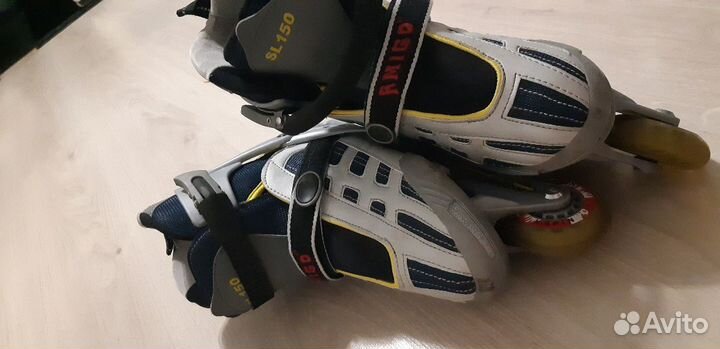 Роликовые коньки