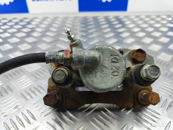 Суппорт задний правый Mitsubishi Pajero Sport 2