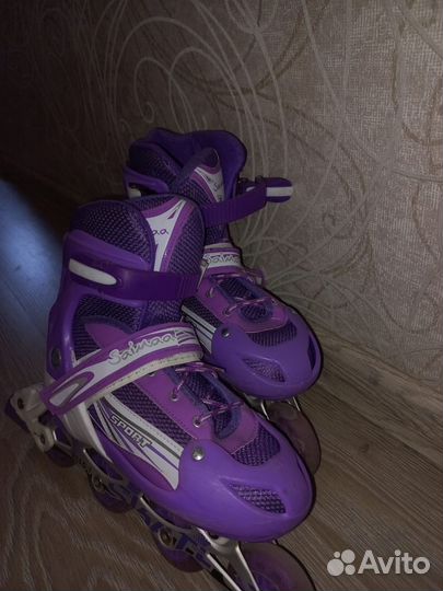 Роликовые коньки