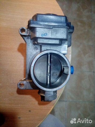 Дроссельная заслонка