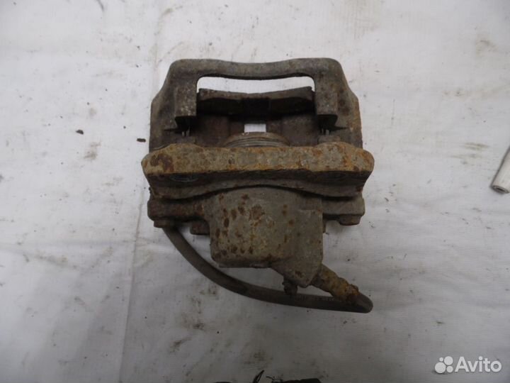 Суппорт тормозной передний левый Renault Logan 1 2