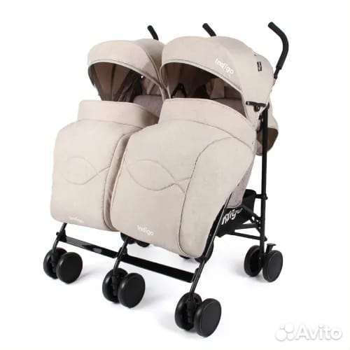 Коляска для двойни погодок