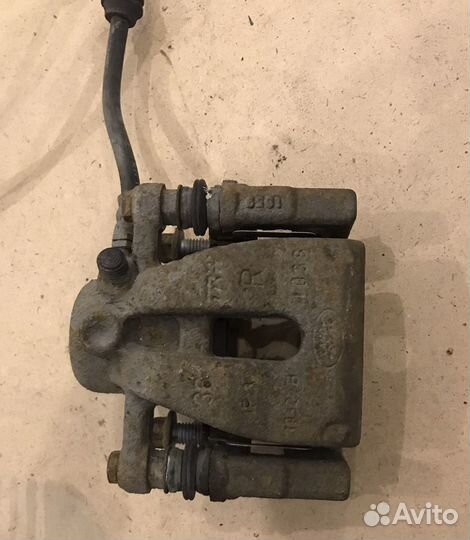 Суппорт тормозной задний правый Land Rover Freelan