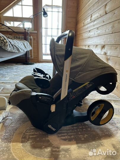 Коляска автокресло doona с базой isofix
