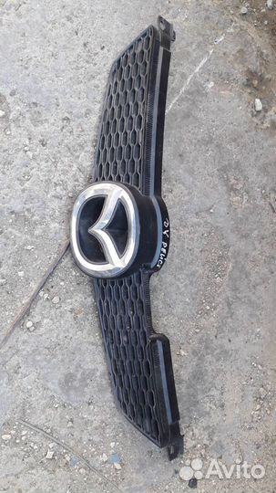 Решётка радиатора Mazda Demio DY