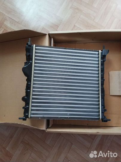 Радиатор renault logan