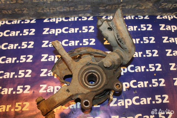 Кулак поворотный передний правый Ниссан Альмера К