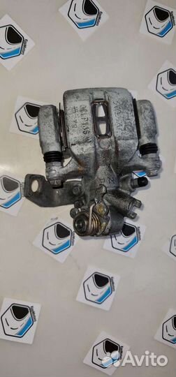 Суппорт задний, левый тормозной Хонда Цивик 4 д