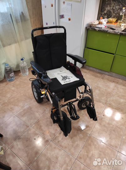 Инвалидная коляска с электроприводом