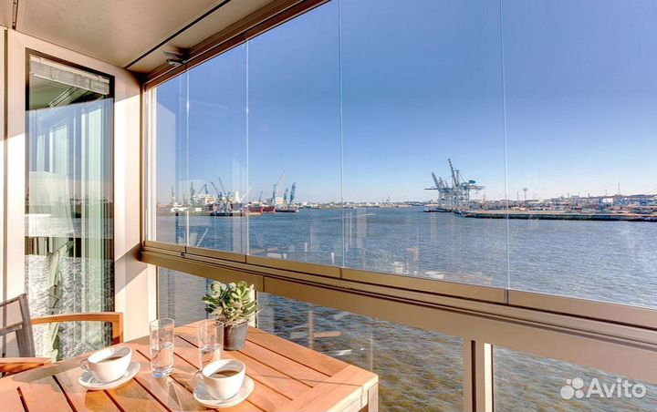 Безрамное раздвижное остекление