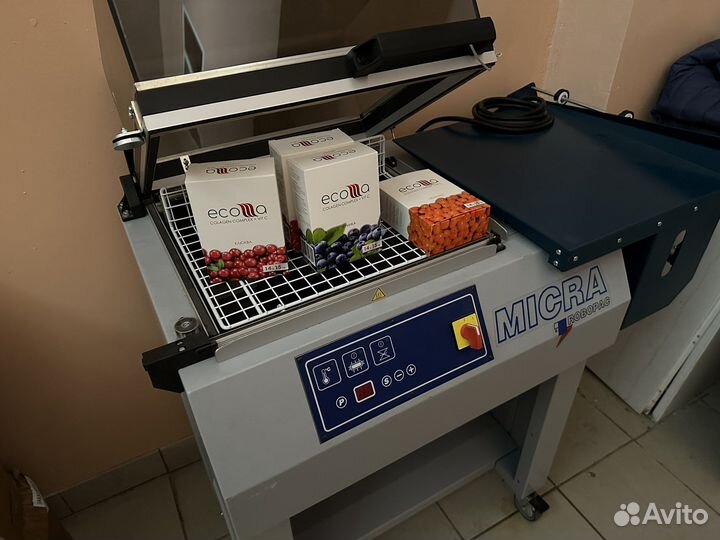 Упаковка в термоусадочную пленку коробок, банок