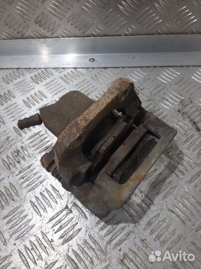 Суппорт передний левый Renault Sandero K7MF710