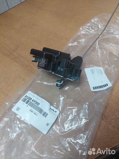 Замок крышки багажника Киа Рио 3