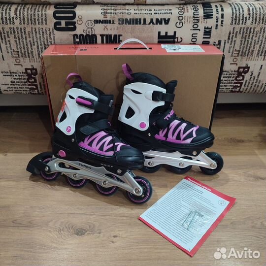 Роликовые коньки