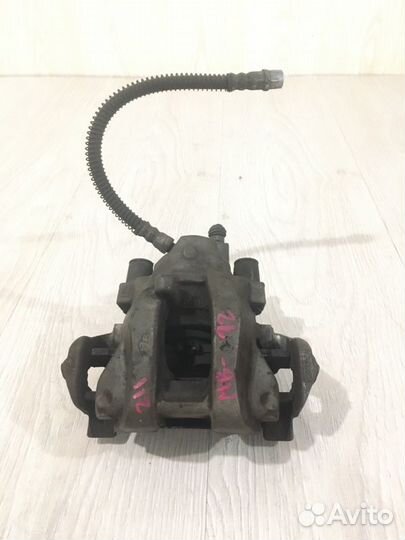 Суппорт тормозной задний левый Mercedes Benz E230