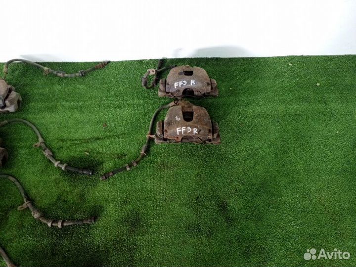 Суппорт тормозной передний Ford Focus 3 2011