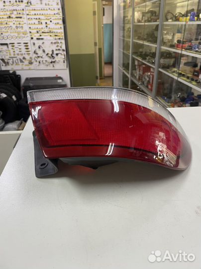 Фонарь задний левый Mazda626
