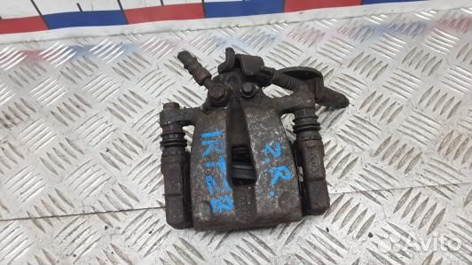 Суппорт тормозной задний правый KIA CEE'D 2 (JD)