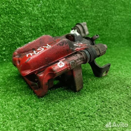 Суппорт тормозной задний правый Opel Astra J GTC