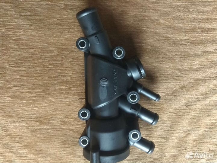 Корпус термостата на Форд фокус 1 1.6л