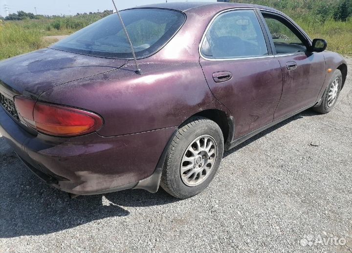 Мазда Кседос 6 по запчастям