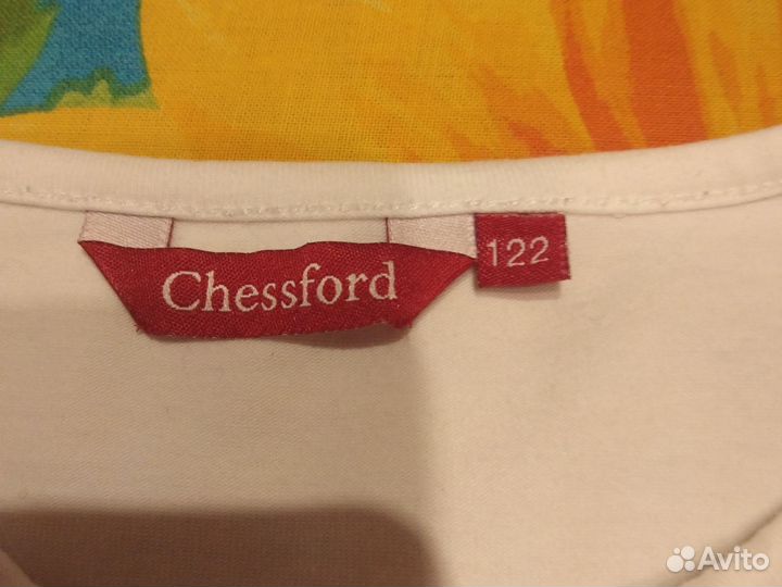 Белая трикотажная блузка