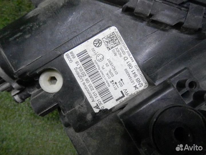 Фара левая Volkswagen Tiguan