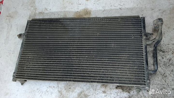 Радиатор кондиционера Mitsubishi Carisma I