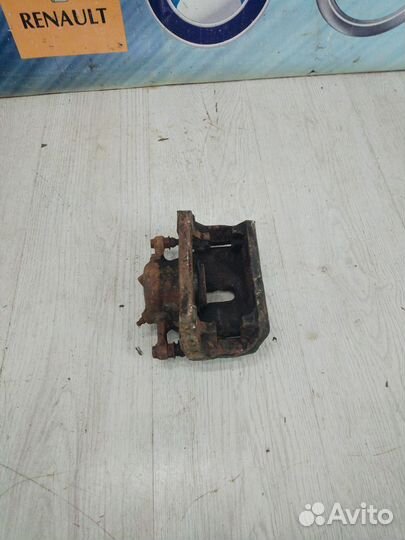 Суппорт тормозной перед Renault kangoo 2 Лев