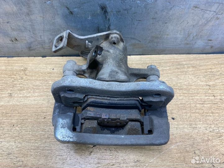 Суппорт тормозной задний правый Kia Rio 3 седан