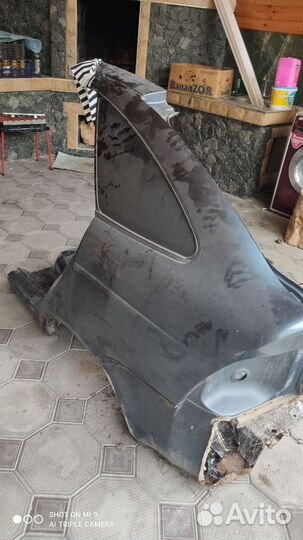 Заднее левое крыло priora