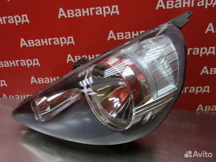 Фара левая Honda Fit GD 01-07