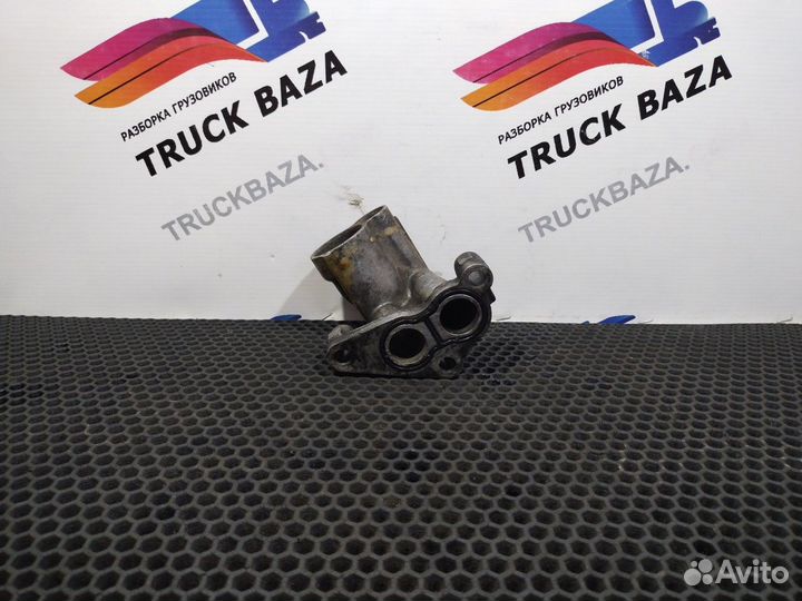 Патрубок масляного фильтра