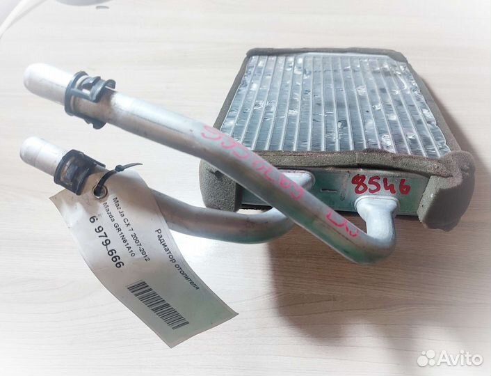 Радиатор отопления бу Mazda grn61a10