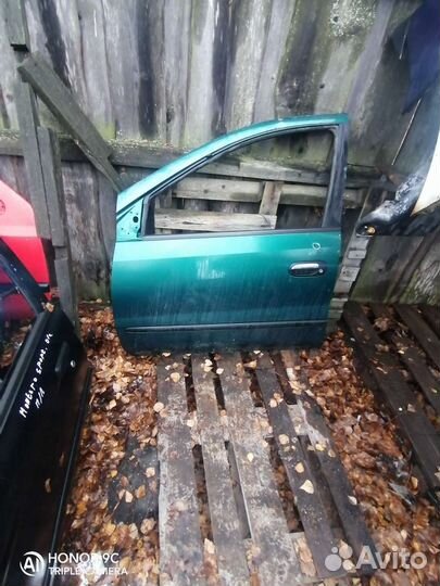 Дверь передняя левая Nissan almera tino