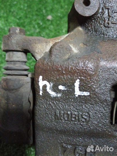 Суппорт тормозной передний левый Kia Optima JF