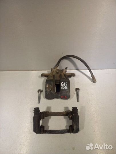 Суппорт передний левый Nissan Almera G15 седан