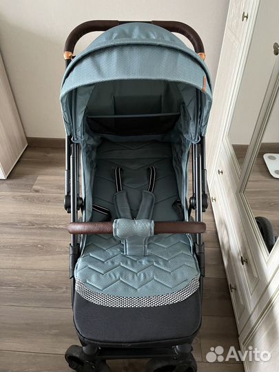 Прогулочная коляска с перекидной ручкой
