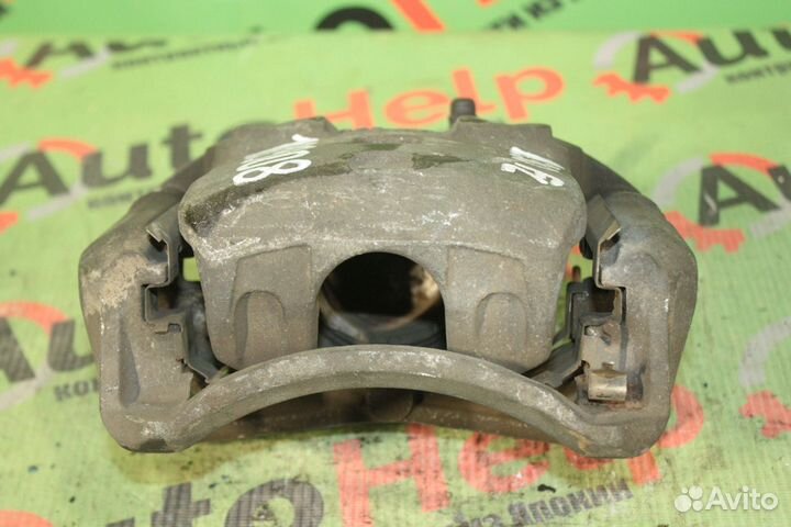 Суппорт nissan lafesta B30 передний левый