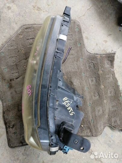 Фара передняя левая Nissan Cube Z12