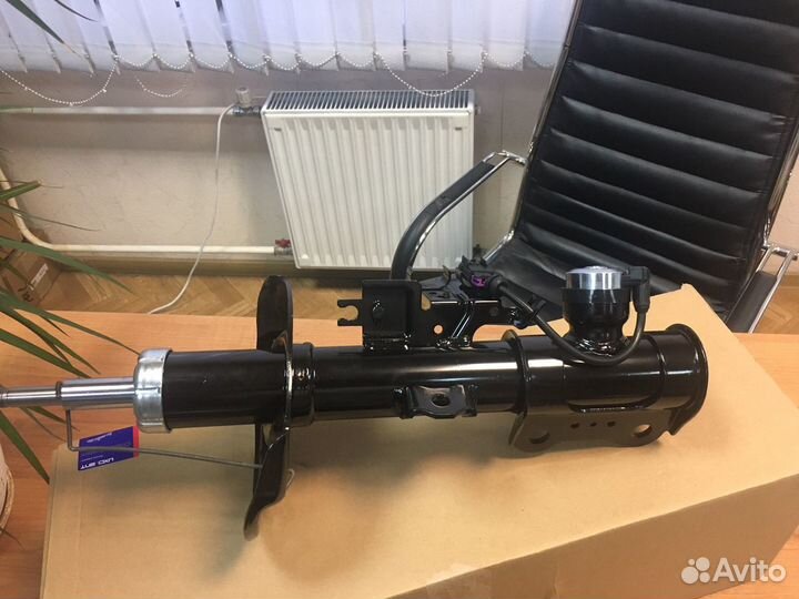 Амортизатор передний Cadillac SRX 2010-2016 LH