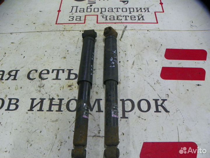 Амортизатор задний Nissan X-Trail II (2007—2011)