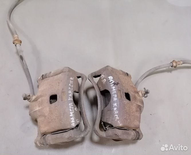 Суппорт тормозн.передн.Nissan Almera N15 CD20 1997