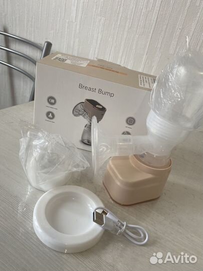 Молокоотсос электрический новый