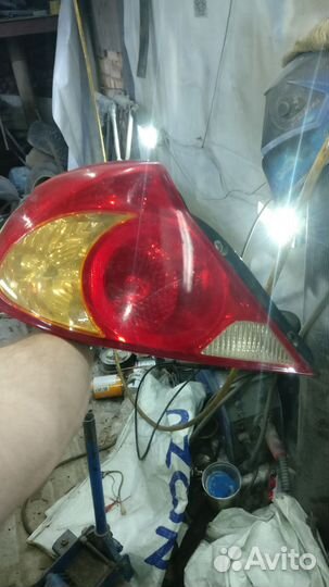 Kia spectra задний левый фонарь