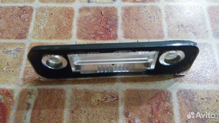 Фонарь подсветки номера Форд