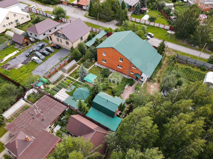 Дом 411 м² на участке 12,5 сот.