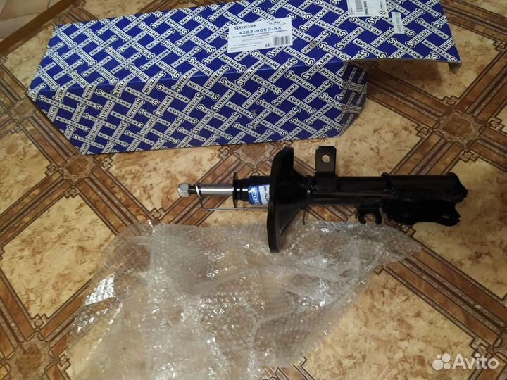 Амортизатор правый передний на киа спектра