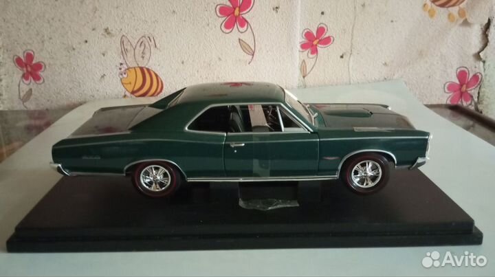 Модель автомобиля Pontiac GTO 1966 Welly 1/18