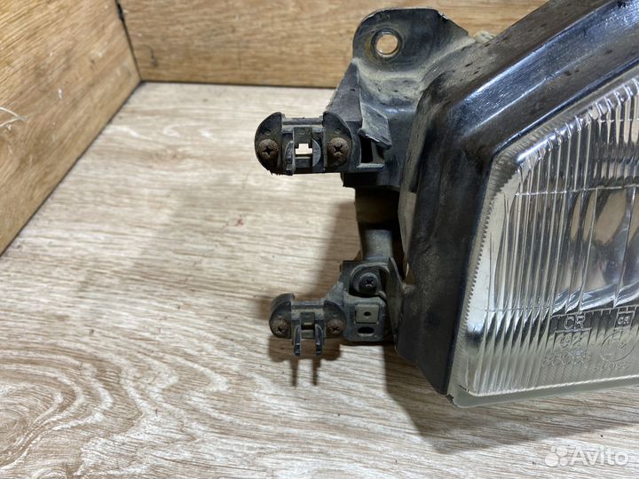 Фара передняя левая Mazda 323 BF 142359